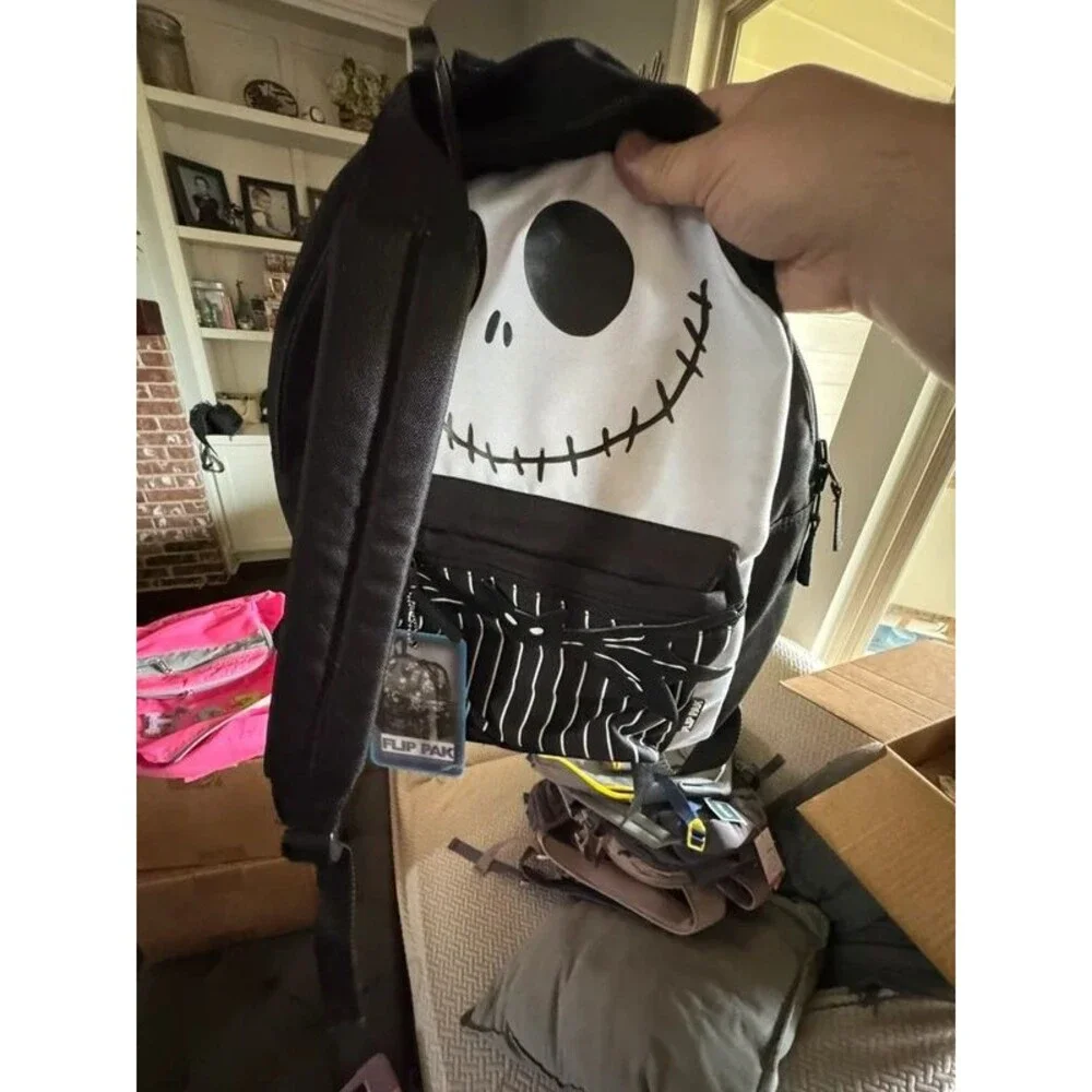 Reversible nightmare before Christmas backpack new with tags, but stained